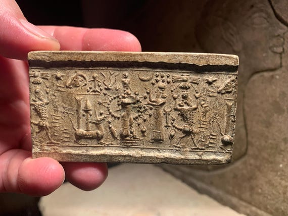 Ishtar - Mesopotamia - Assyrian cylinder seal impression. Astronomical motif