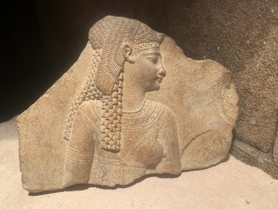 Egyptian art - Cleopatra dressed as the Goddess Isis - Relief sculpture fragment