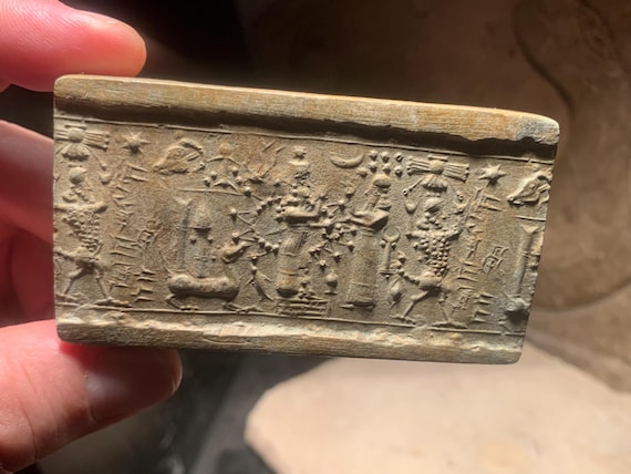 Ishtar - Mesopotamia - Assyrian cylinder seal impression. Astronomical motif