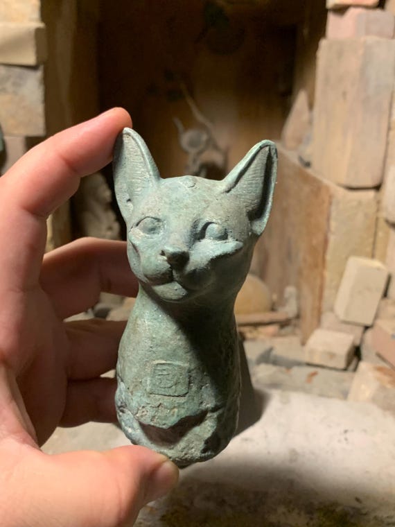 Egyptian-statue-fragment-Cat-goddess- Bast / Bastet wearing the eye of Horus