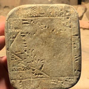 Sumerian / Mesopotamian cuneiform writing - mathematical tablet - calculation of the surface area of residential land.