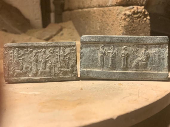 Sumerian and Assyrian cylinder seal impressions x 2 - Ur Nammu and Ishtar. Mesopotamia