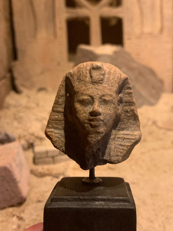 Egyptian statue bust replica fragment of King Tutankhamun 18th dynasty. Post Amarna period art