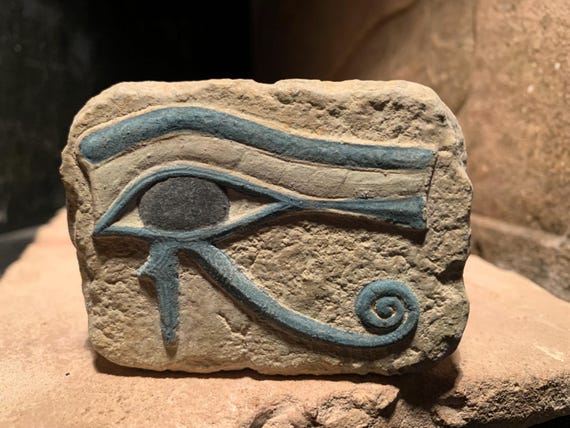 Egyptian Art - Eye of Horus amulet. Ancient Egypt carving / Sculpture