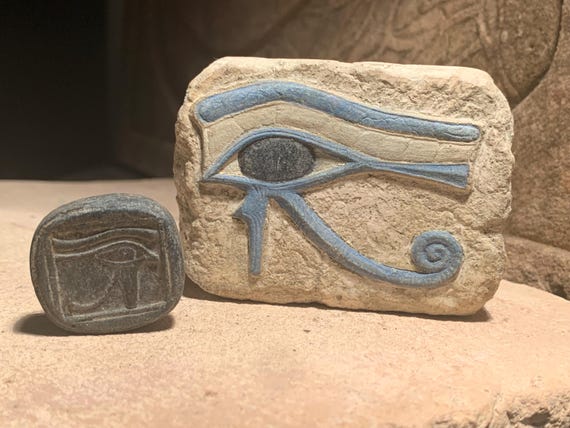 Egyptian Art - Eye of Horus & Ra amulets. Ancient Egypt carving / Sculpture