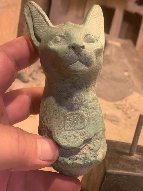 Egyptian-statue-fragment-Cat-goddess- Bast / Bastet wearing the eye of Horus