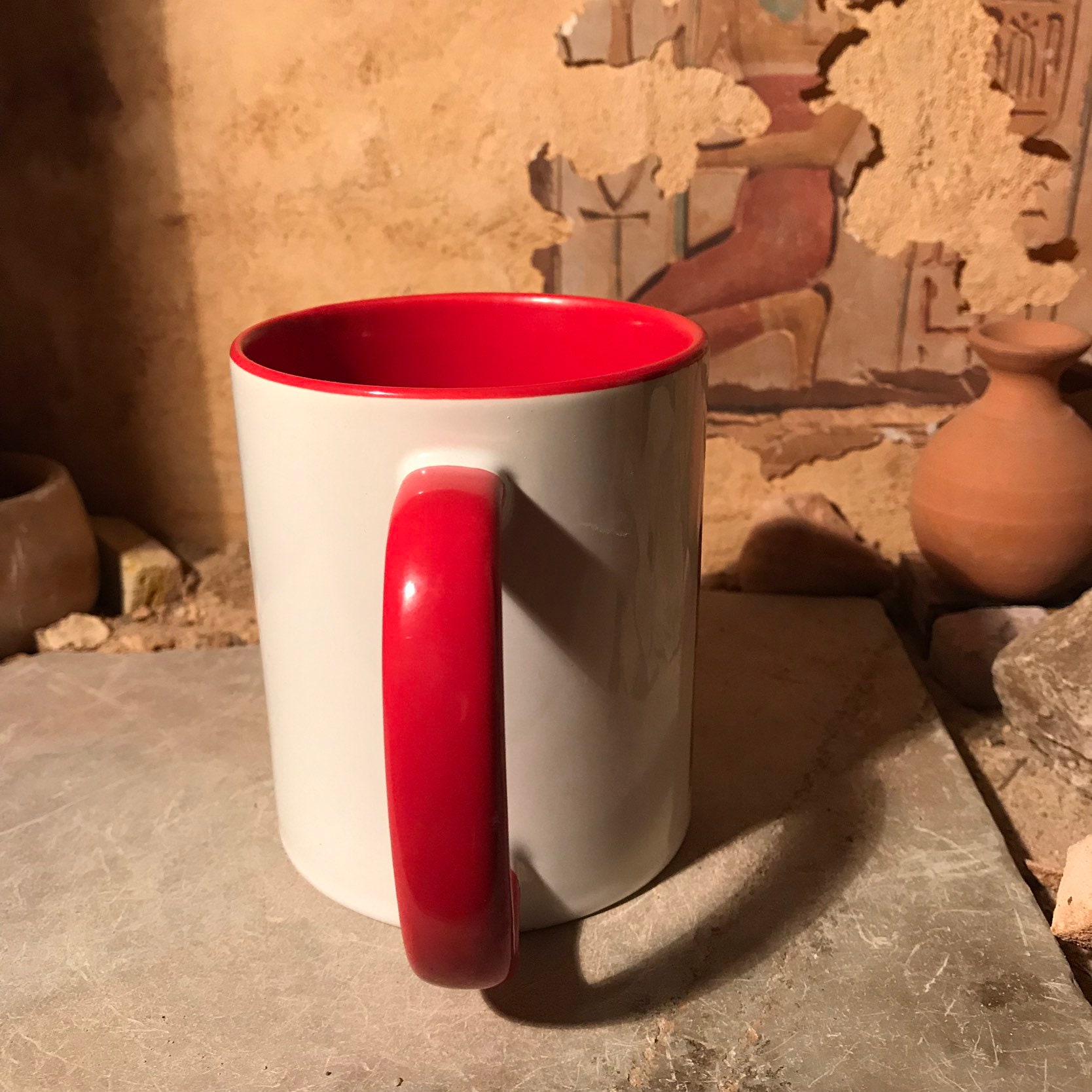 Egyptian coffee or tea cup featuring the goddess Maat. Ancient Egypt art.