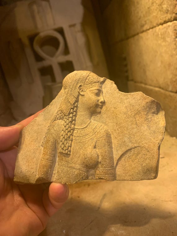 Egyptian art - Cleopatra dressed as the Goddess Isis - Relief sculpture fragment
