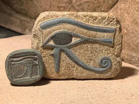 Egyptian Art - Eye of Horus & Ra amulets. Ancient Egypt carving / Sculpture