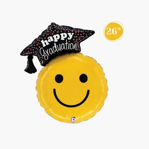 May include: A yellow smiley face balloon with a black graduation cap that reads "Happy Graduation." The balloon is 26 inches in diameter. The cap is black with colorful polka dots and a black tassel.
