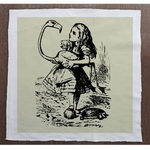 May include: A black and white illustration of a girl holding a flamingo in a garden setting. The girl is wearing a dress and has long hair. The flamingo is standing on one leg and has its head turned to the side. The illustration is on a light beige background.