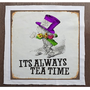May include: A vintage-style sign with a cartoon illustration of the Mad Hatter from Alice in Wonderland holding a teacup. The sign reads "It's Always Tea Time".