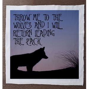 May include: A black silhouette of a wolf against a purple and blue gradient background. The text "THROW ME TO THE WOLVES AND I WILL RETURN LEADING THE PACK" is written in black at the top of the image.