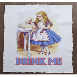 May include: A vintage illustration of a young girl in a blue and white dress holding a bottle with the words "Drink Me" on the label. The girl is standing next to a table with a golden key on it. The text "Drink Me" is written in large, blue letters with a red outline.