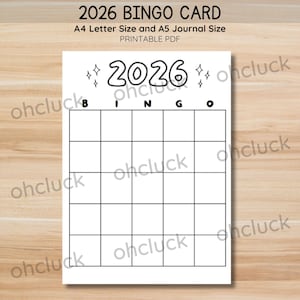 May include: A white printable bingo card for 2026, with the text "2026 BINGO CARD" at the top. The card is divided into a 5x5 grid with the letters B-I-N-G-O above the columns. The card is A4 Letter Size and A5 Journal Size.