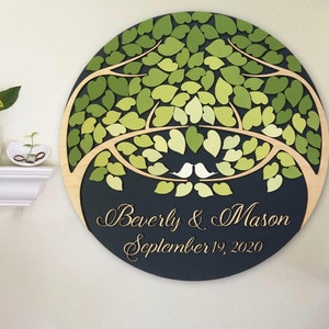 Guest book alternative round 3D wood sign with personalized names and date and fresh green ombre leaves, unique custom guestbook wall decor