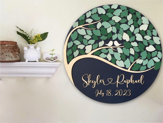 Guest book alternative sign in for wedding or anniversary made with one tree and personalized names and colors with heart between names Il_570xn