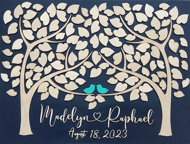 Wood 3D guest book alternative with custom names for wedding. The colors can be changed to match the wedding decor. Copyright belongs to SignYoustyle