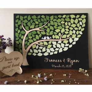 Ombre wedding guest book alternative in fading green shades and leaves hearts to sign made of wood and in 3D