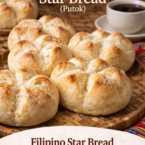May include: Close-up of Filipino Star Bread (Putok), a sweet, buttery bread dusted with sugar. The image shows several star-shaped loaves on a woven tray, with a cup of coffee in the background. Text on the image reads "Filipino Star Bread".