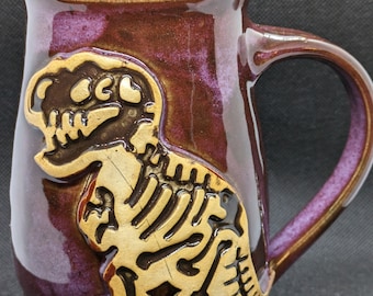 handmade stoneware, Pottery coffee mug with dinosaur fossil approx 16oz ready to ship velociraptor or t-rex dinosaur