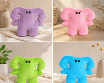 Simpatico mostro di peluche, amichevole alieno di peluche, morbido mostro di peluche da regalare