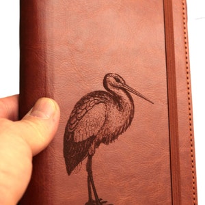 Customizable engraved stork zoological illustration journal leather bound, strip with the same color to keep it