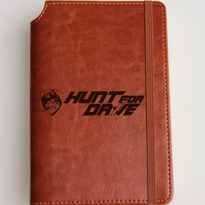 Personalized engraved company logo leather bound, elastic strip with the same color media company