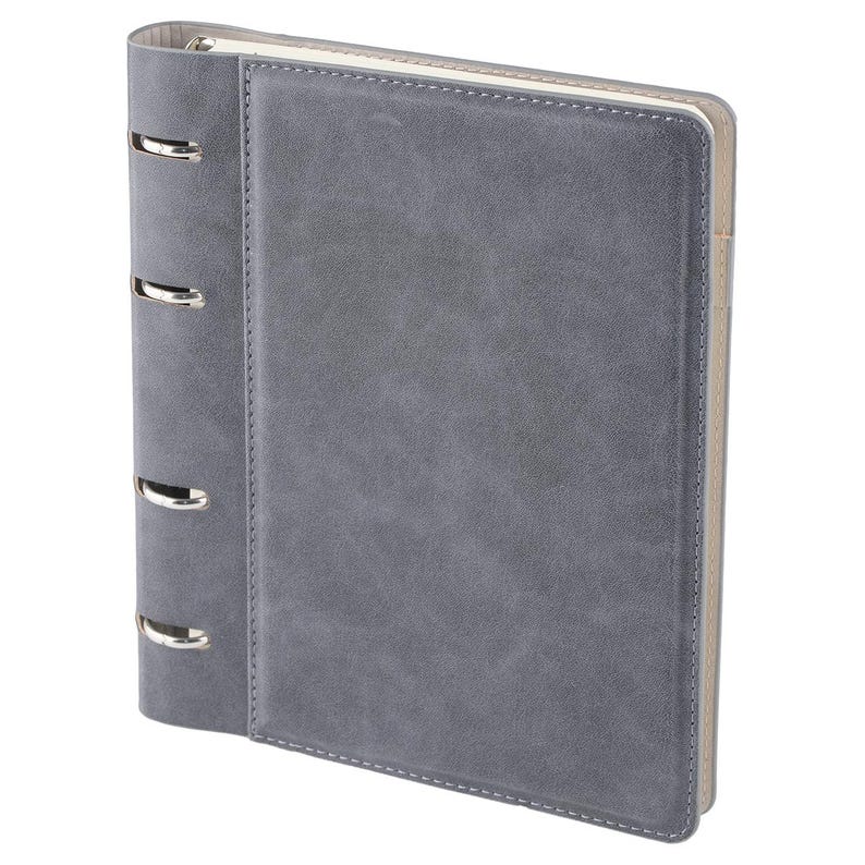 May include: A slate gray binder featuring a smooth, matte-textured cover with visible stitching along the edges. The spine includes four silver-toned metal rings for securing pages, and the interior edges show a light beige lining.