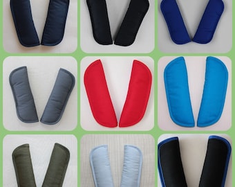 Stroller shoulder pads