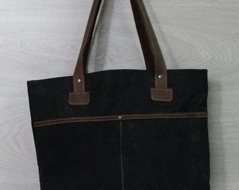 Bag made from waxed canvas and leather