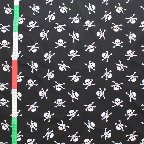 Cotton fabric  white skulls on a black