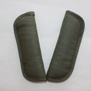 Protectores para los cinturones de silla de paseo