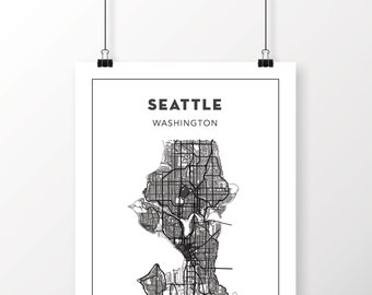 May include: A black and white map of Seattle, Washington. The map shows the city's streets and waterways. The city's name is printed at the top of the map.