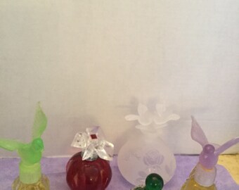 Perfume bottles, Antique collectibles from 1980s. Beautiful colors and perfume in some of them, Delicate Birds and Flowers.