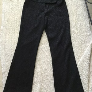 Lace look , black brocade pants, semi bell bottom, that is flattering for your body