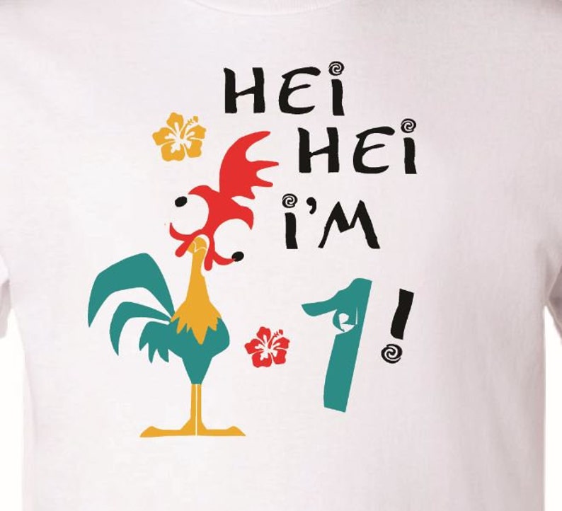 May include: White t-shirt with a cartoon rooster and the text "Hei Hei I'm 1!"