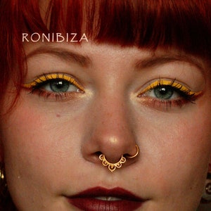 Crown septum piercing 2025