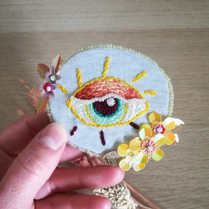 Yellow and orange eye, hand embroidery brooch with sequins and beads. image 9