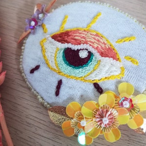 Yellow and orange eye, hand embroidery brooch with sequins and beads. image 5