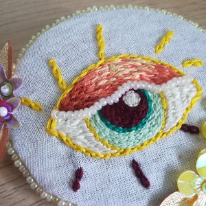 Yellow and orange eye, hand embroidery brooch with sequins and beads. image 7