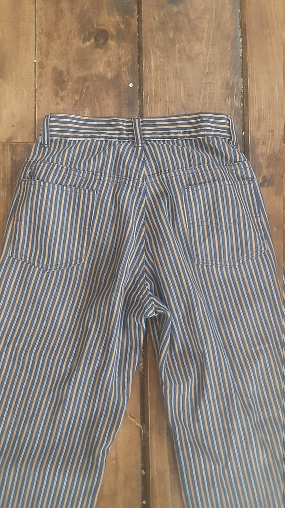 Levi 1970 stripe rock roll vintage mid rise bellbottom flare jean perm press USA women 26x29.5 pant wear sneaker t shirt jacket