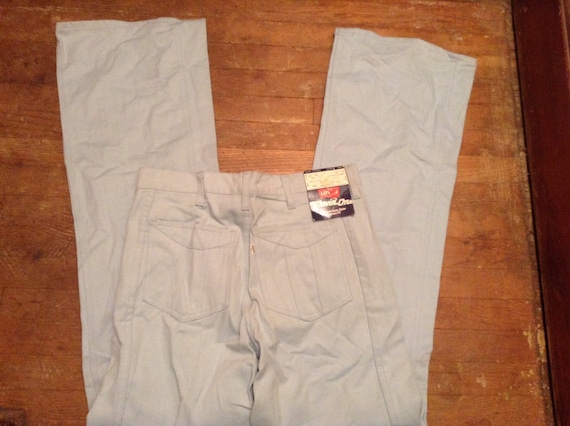 Deadstock vintage Levi cotton boot cut jeans made… - image 2