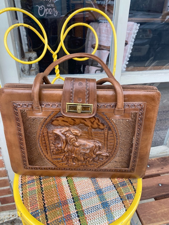 hand tooled leather bag.