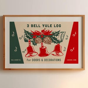May include: Framed vintage Christmas print featuring a festive design. The artwork displays three red bells, holly, and pinecones, with the text "3 BELL YULE LOG" and "For DOORS & DECORATIONS". The color scheme includes red, green, and cream tones.