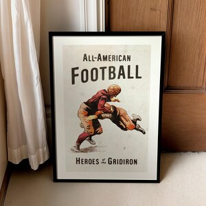 May include: A vintage poster with a black frame featuring two football players in action. The poster has the text "All-American Football Heroes of the Gridiron".