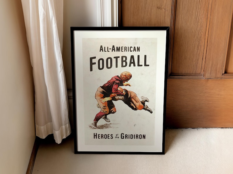 May include: A vintage poster with a black frame featuring two football players in action. The poster has the text "All-American Football Heroes of the Gridiron".