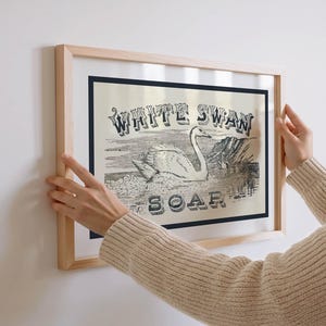 May include: A distressed wooden sign, reading "Welcome to our home" in white lettering. The sign has a rustic finish, ideal for adding a welcoming touch to any entrance.