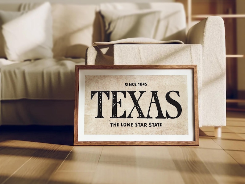 May include: A framed print with a vintage aesthetic featuring the text "SINCE 1845 TEXAS THE LONE STAR STATE" in black lettering on a beige background.
