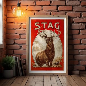 May include: Vintage poster with a red background and the word "STAG" in large white letters. A drawing of a stag with large antlers is in the center of the poster.
